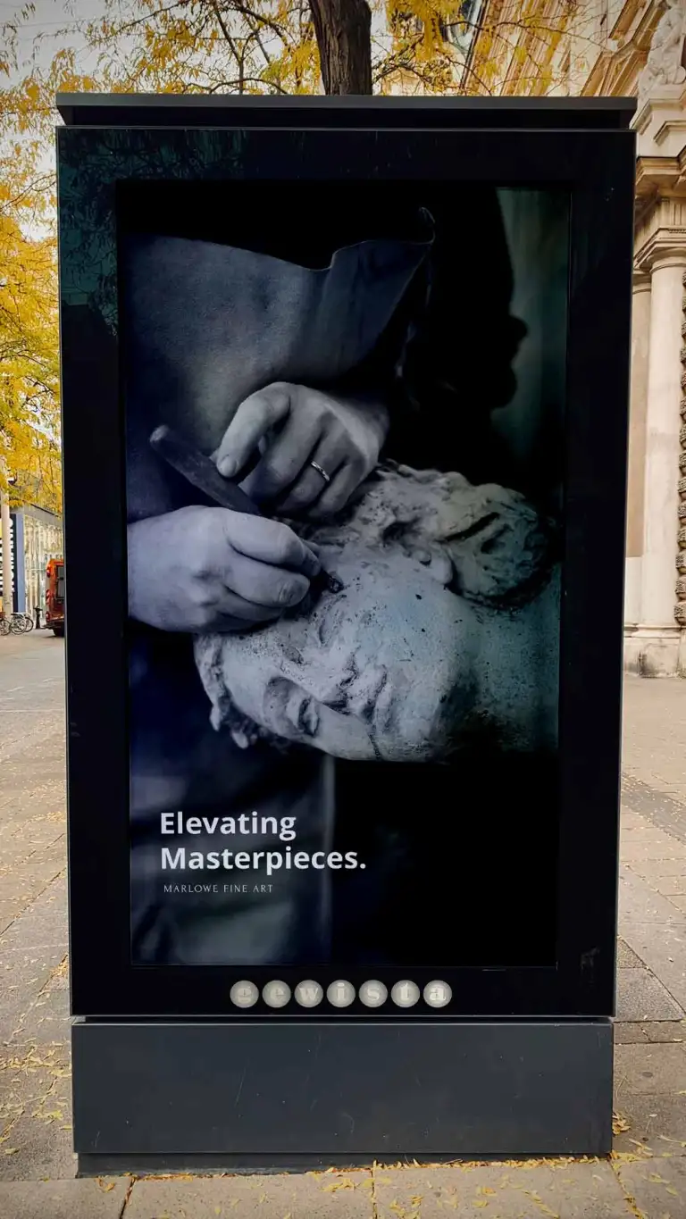 Street sign ad with three dimensional sculpture